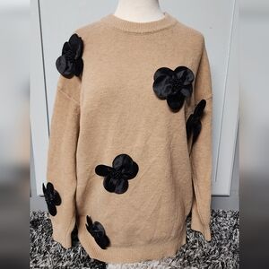 Chic Tan Sweater with Black Floral Details